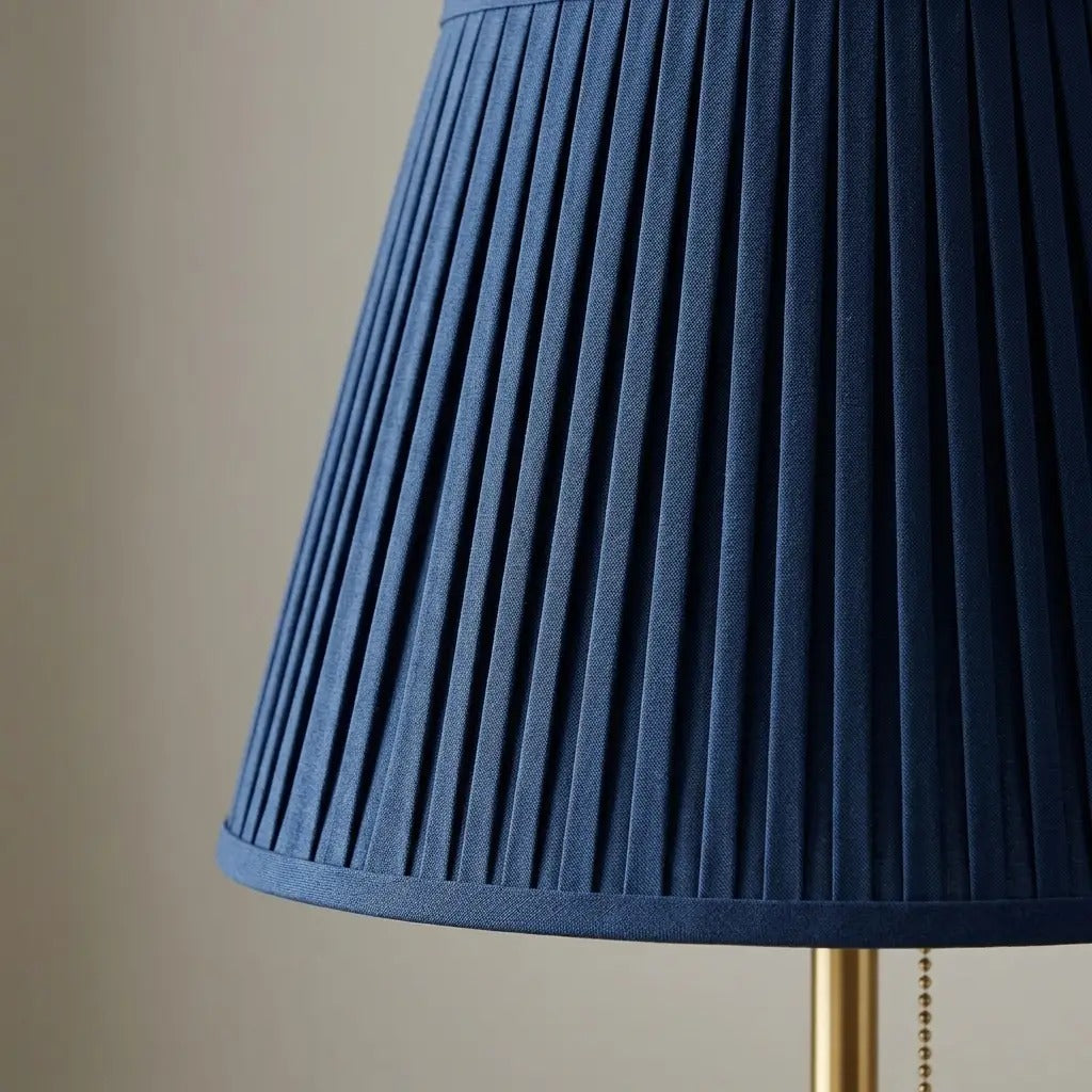 AzureGlow blue pleated table lamp with a brass base