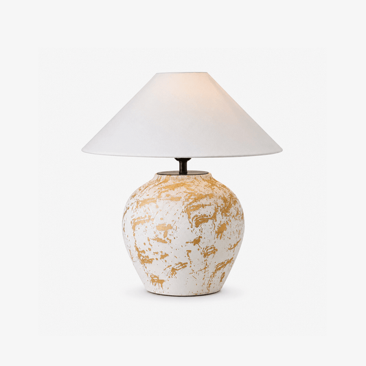 Ceramic urn table lamp with gold splash glaze and off-white fabric shade
