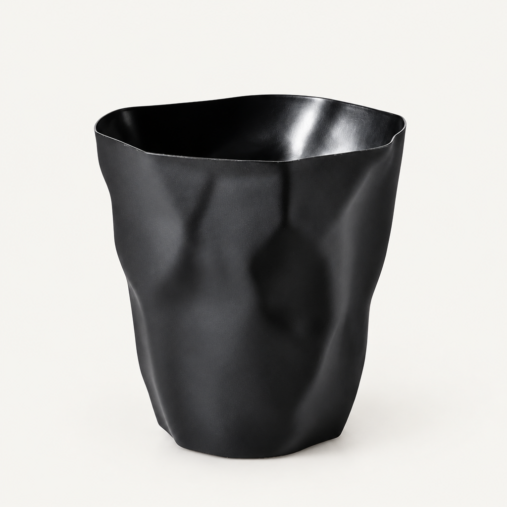 Minimalist Wastebasket with Irregular Shape on a plain light background