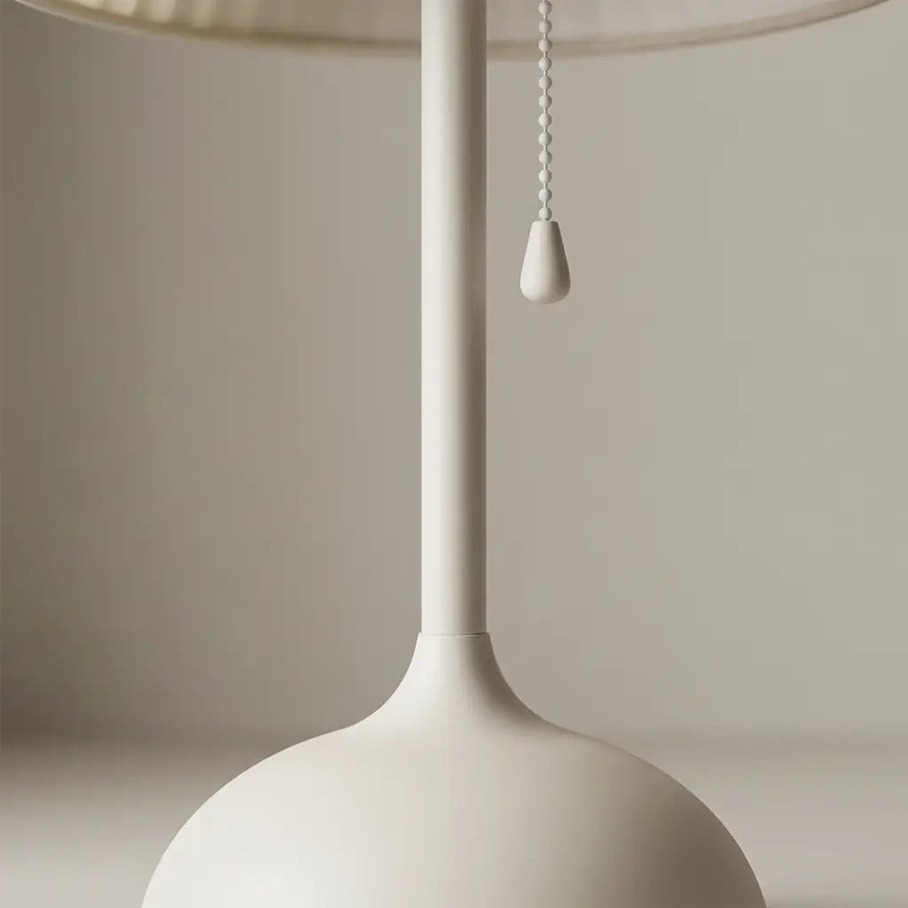 MistGlow pleated fabric table lamp with a matte base
