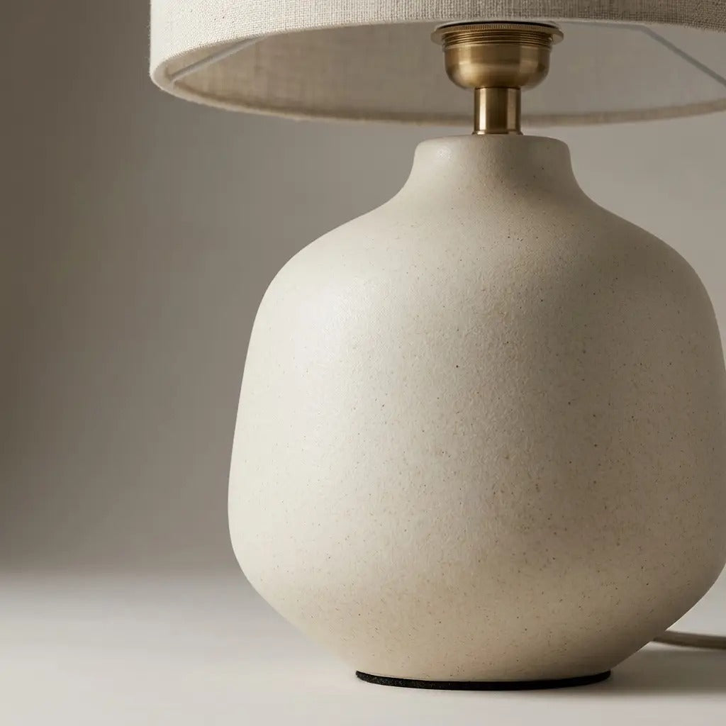 PearlGlow ivory ceramic table lamp with a cylindrical shade